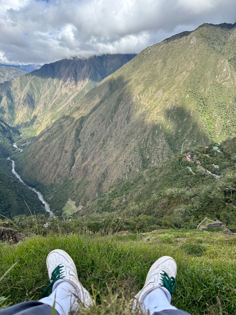 green sneakers on the trail